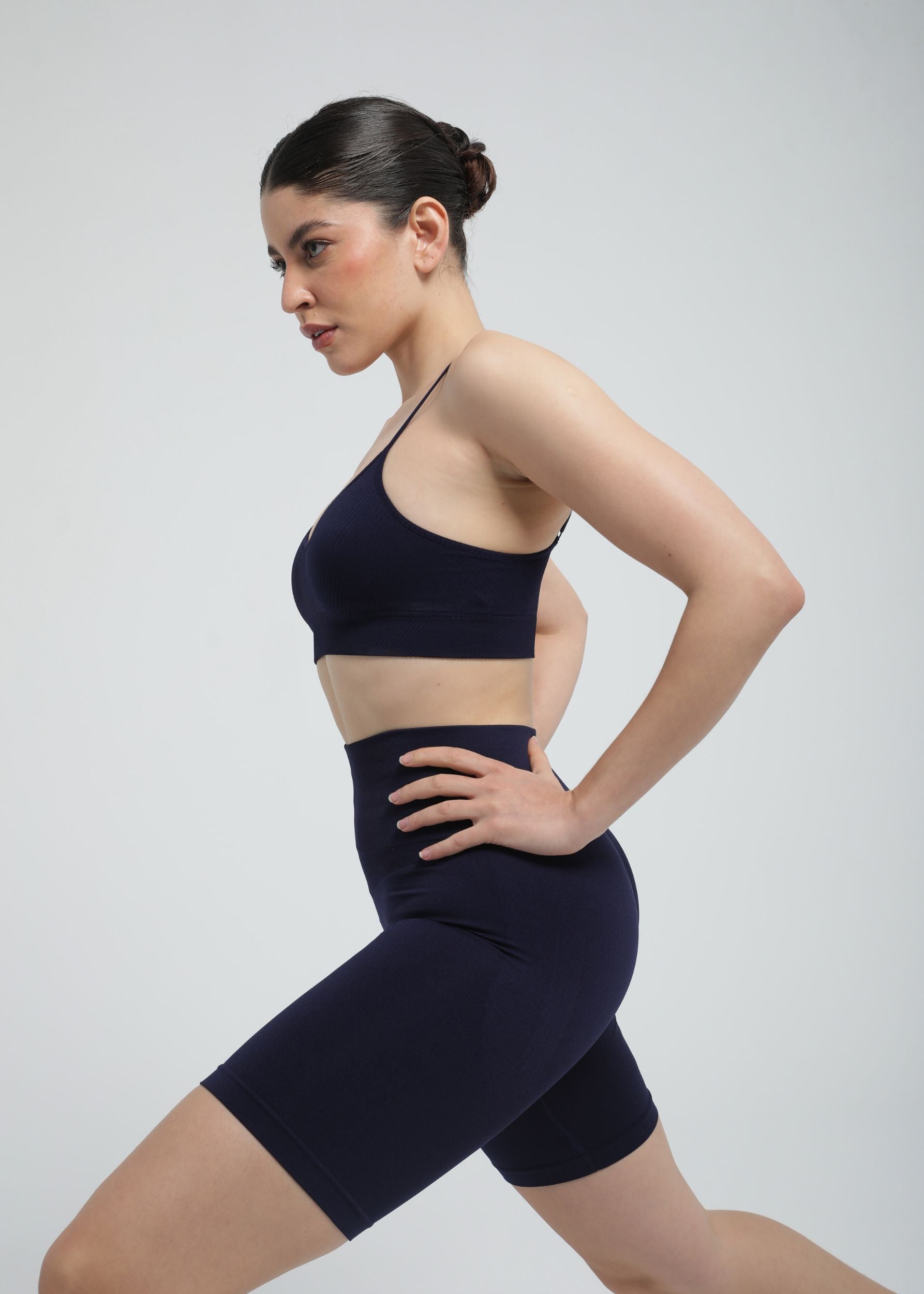 Second Skin Essential Sculpting Bralette in Midnight Navy, side profile with sculpting compression