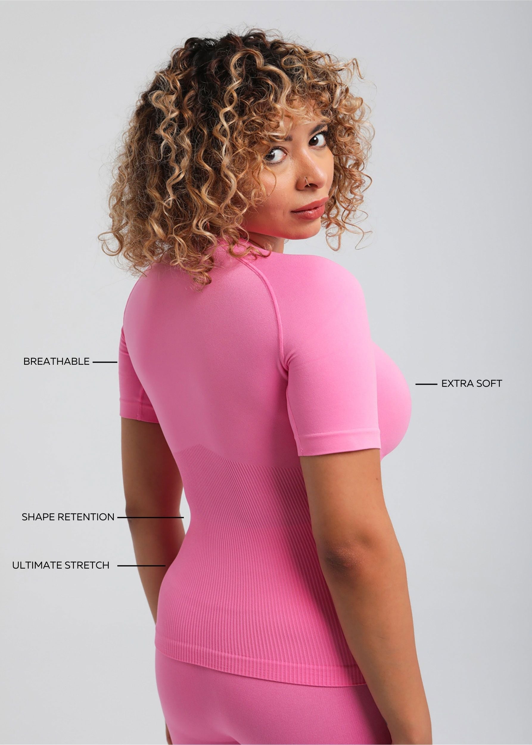Second Skin Essential Sculpting T-Shirt in Rose Pink, side profile highlighting sculpted shape