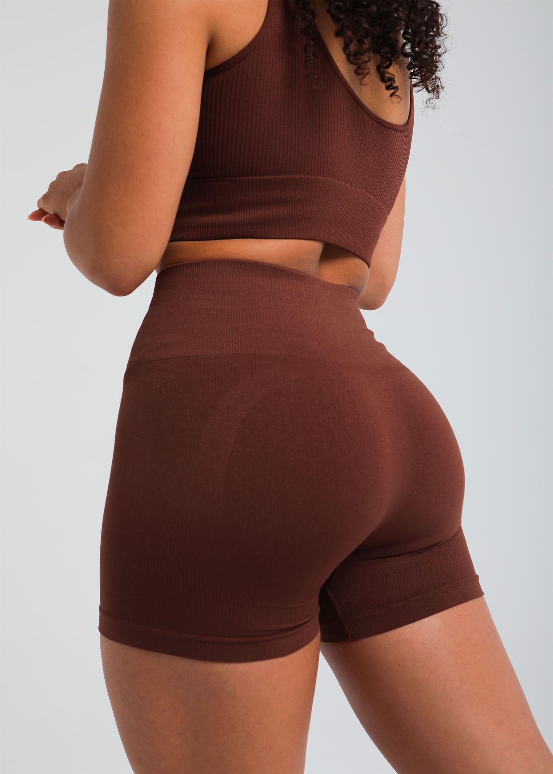 Back view of Cocoa Brown second-skin sculpting shorts with high-waist support