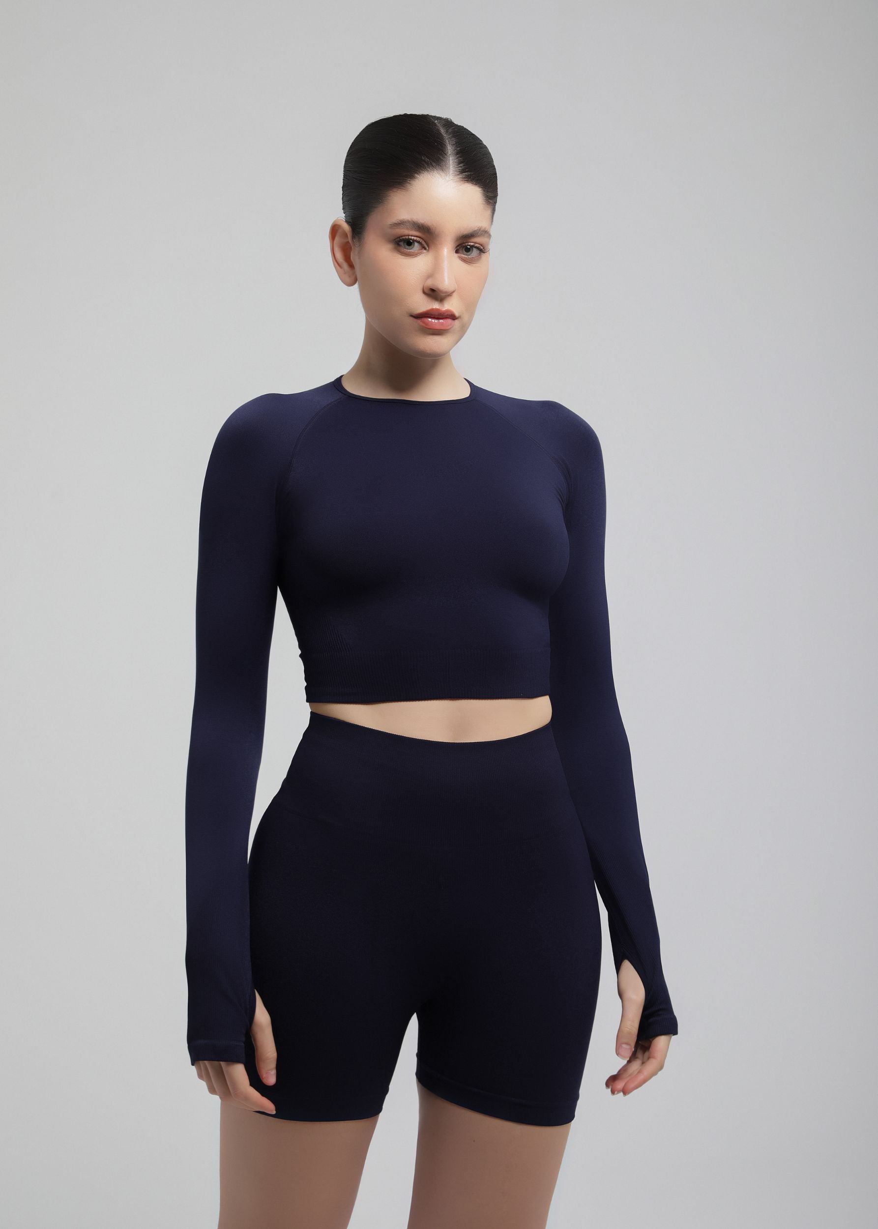 Front view of Midnight Navy second-skin sculpting shorts with mid-thigh length