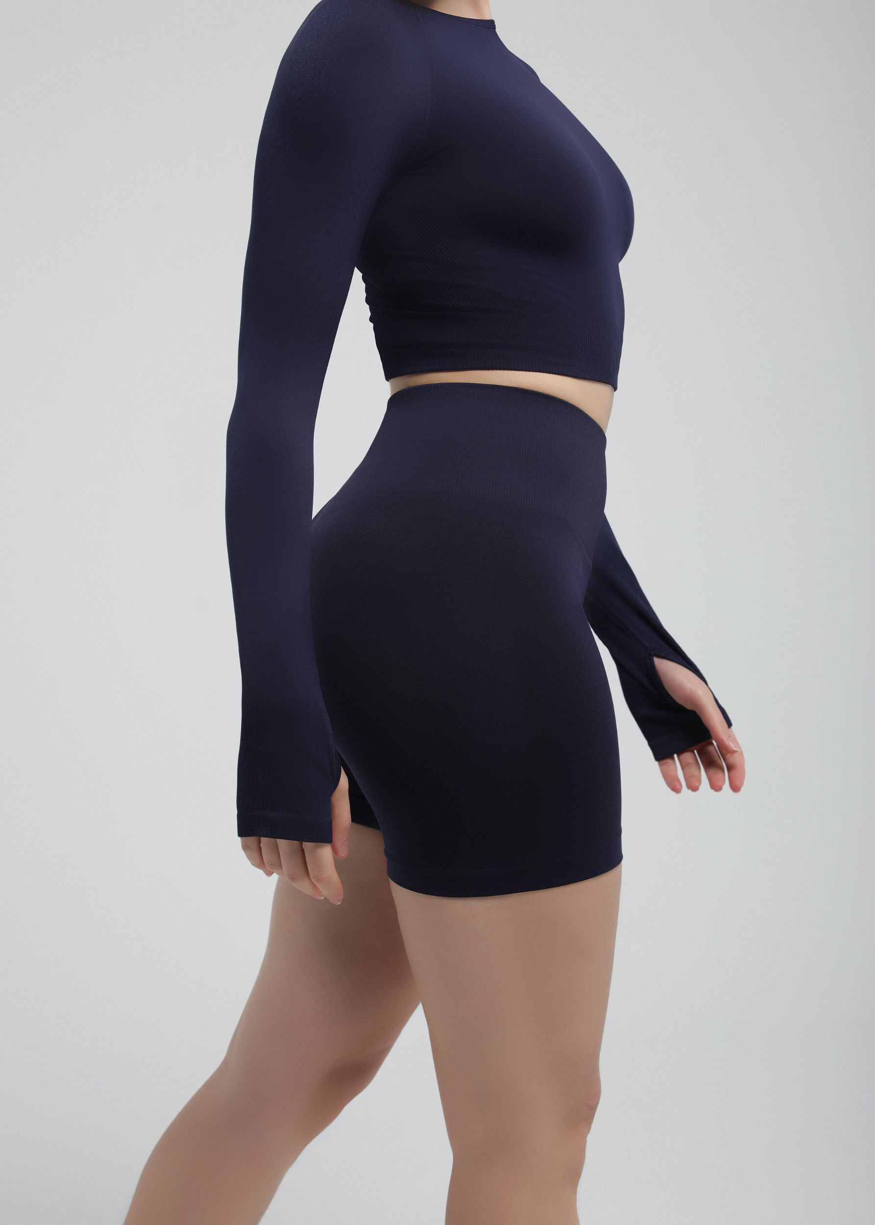 Side view of Midnight Navy seamless high-waist sculpting shorts