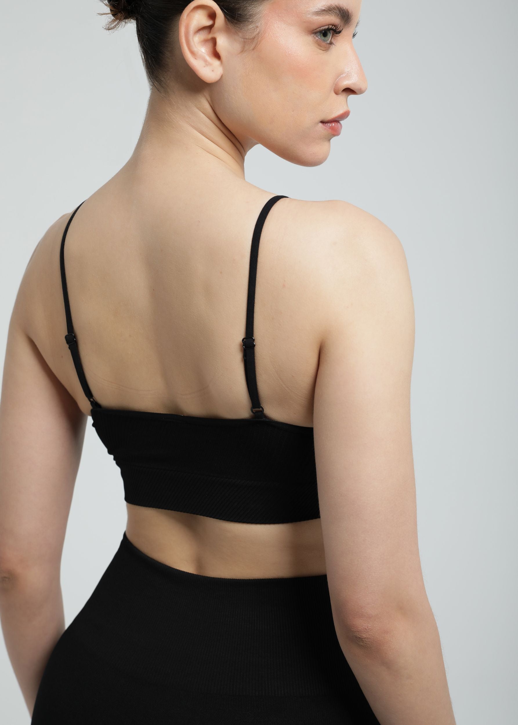Close-up of adjustable straps on Second Skin Essential Sculpting Bralette in black