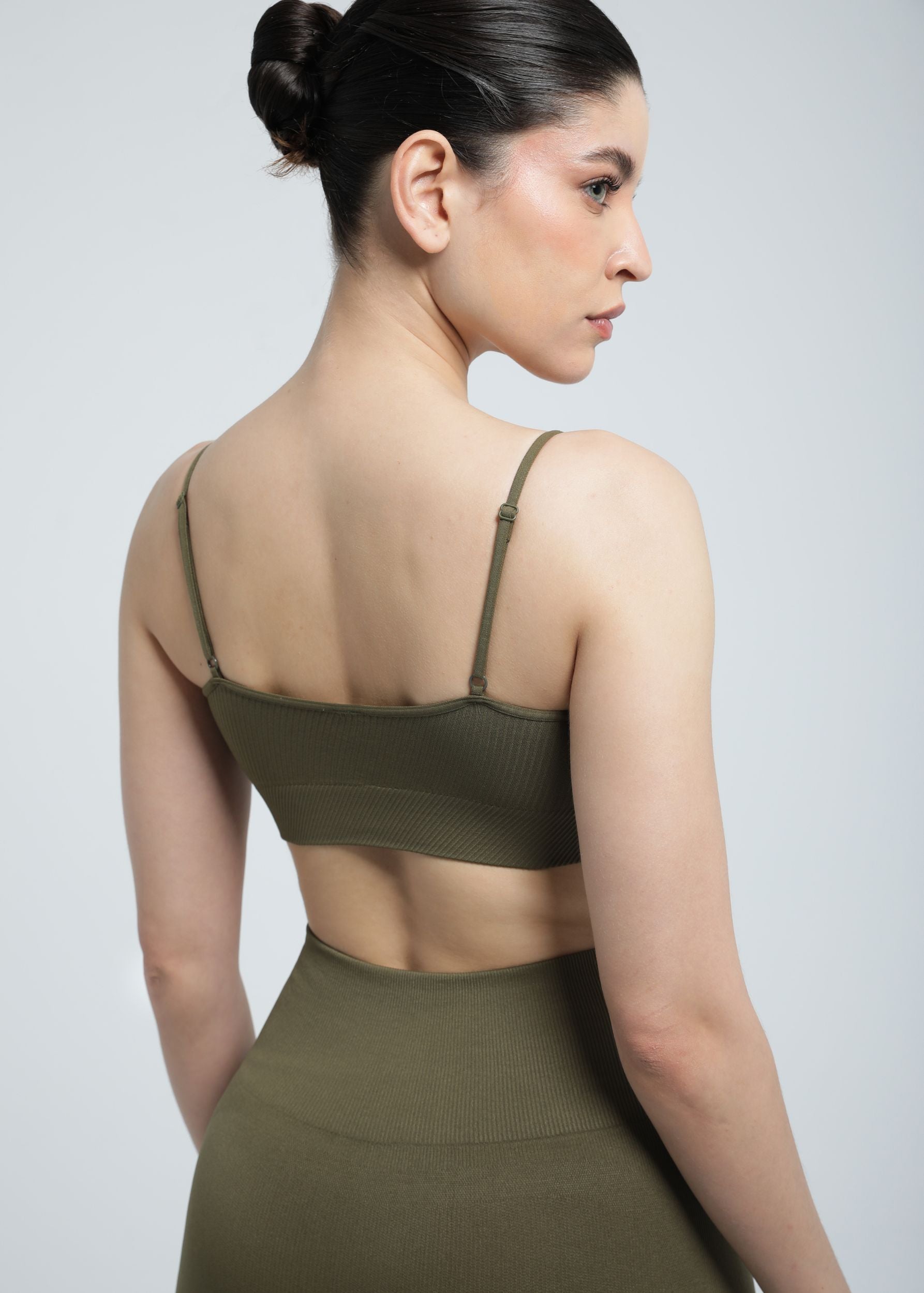 Second Skin Essential Sculpting Bralette in Olive Khaki, side angle showing compression