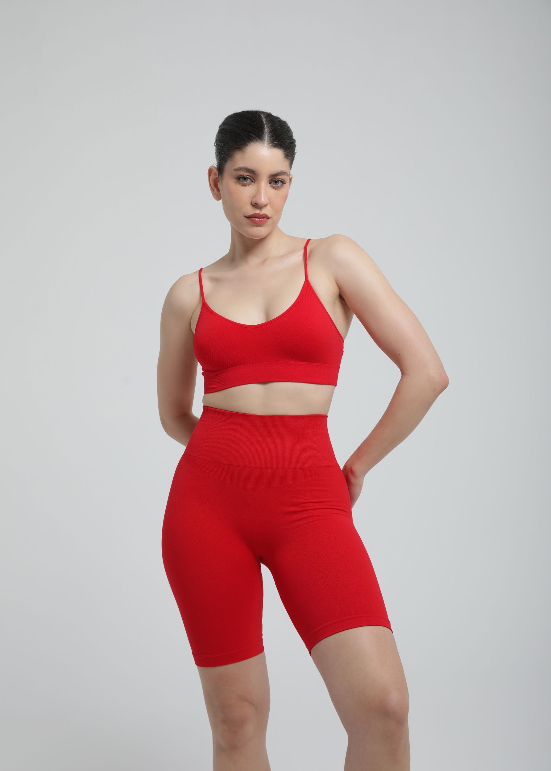 Second Skin Essential Sculpting Bralette in True Red, styled with matching Second Skin bottoms