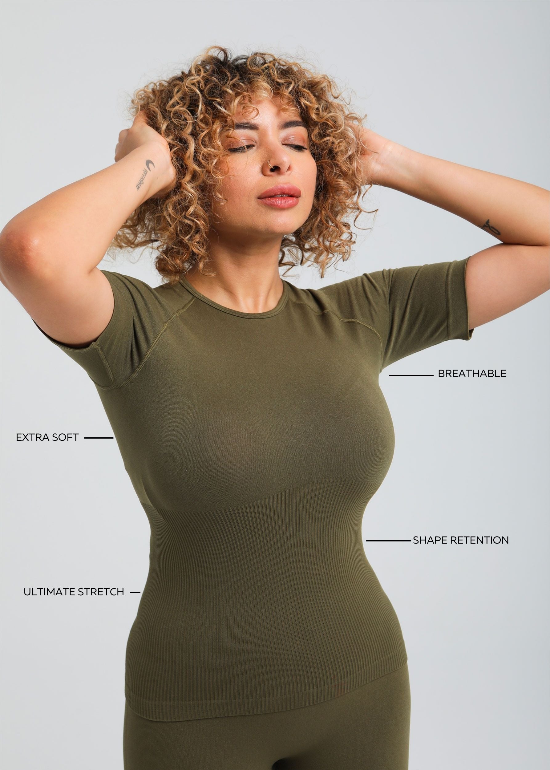Second Skin Essential Sculpting T-Shirt in Olive Khaki, side angle emphasizing compression fit