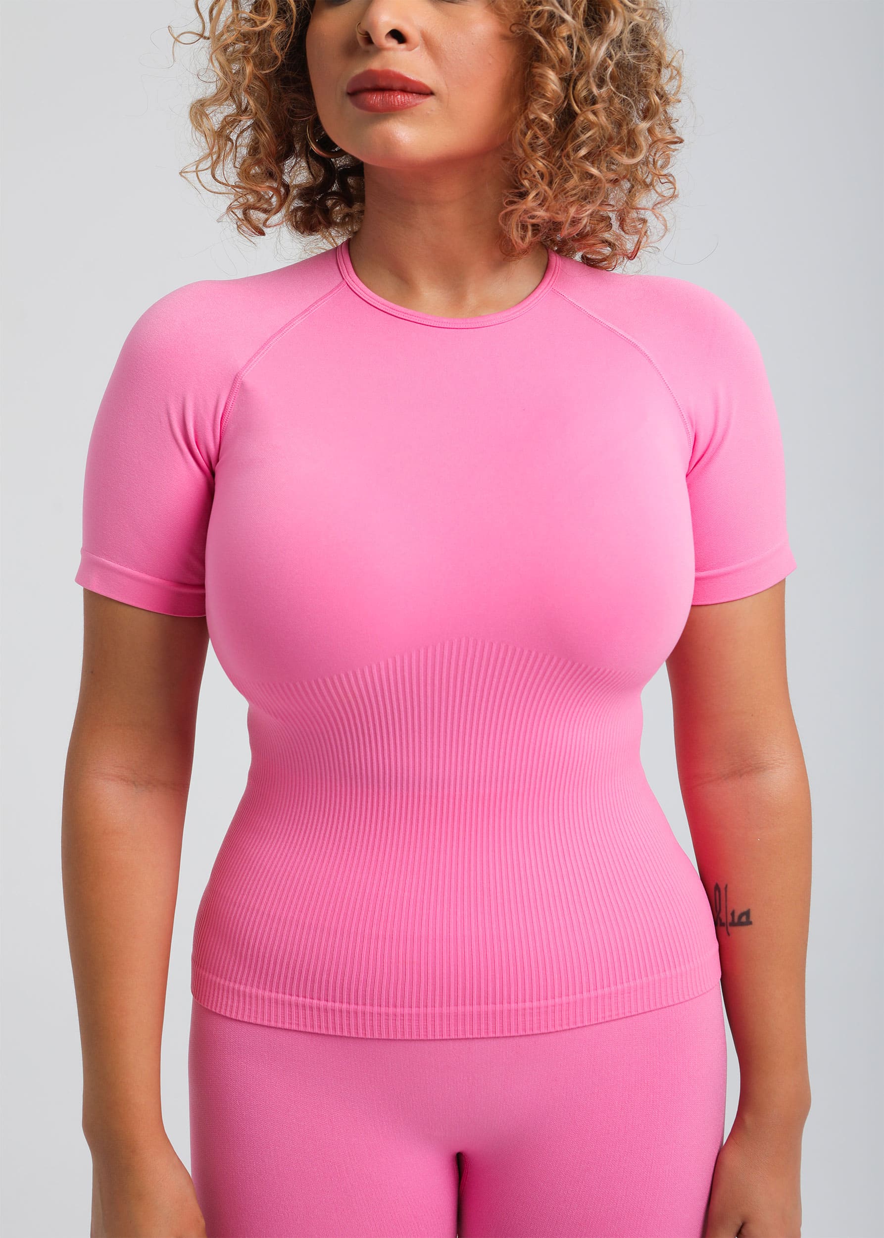 Second Skin Essential Sculpting T-Shirt in Rose Pink, front view with soft seamless fit