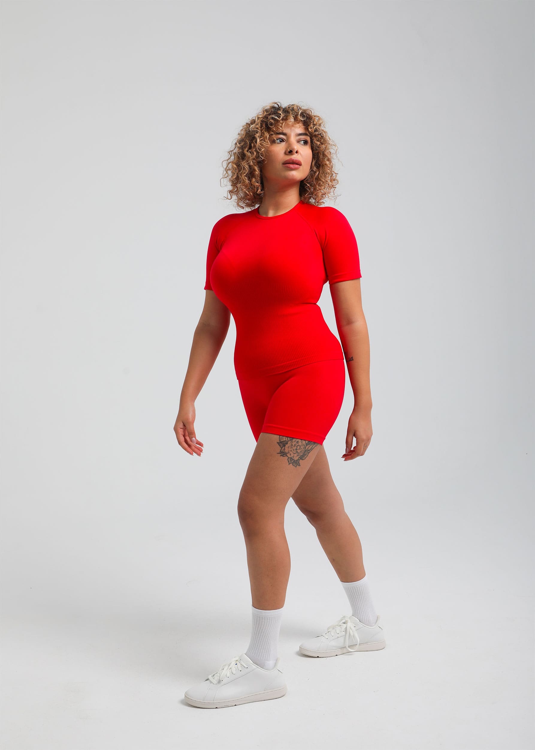 Second Skin Essential Sculpting T-Shirt in True Red, styled with matching Second Skin shorts
