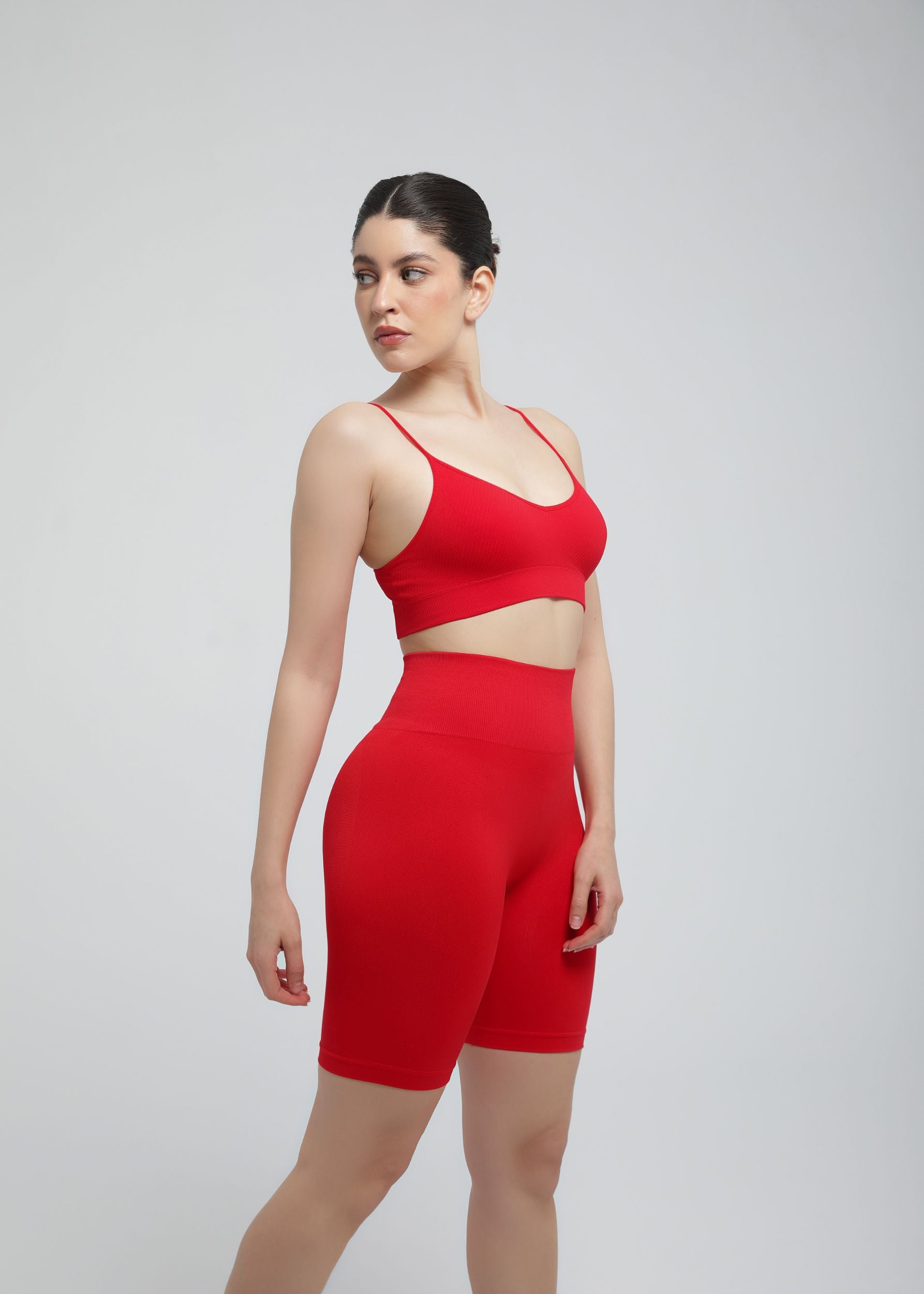 Full-body view of true red Second Skin biker short highlighting compression and clean silhouette