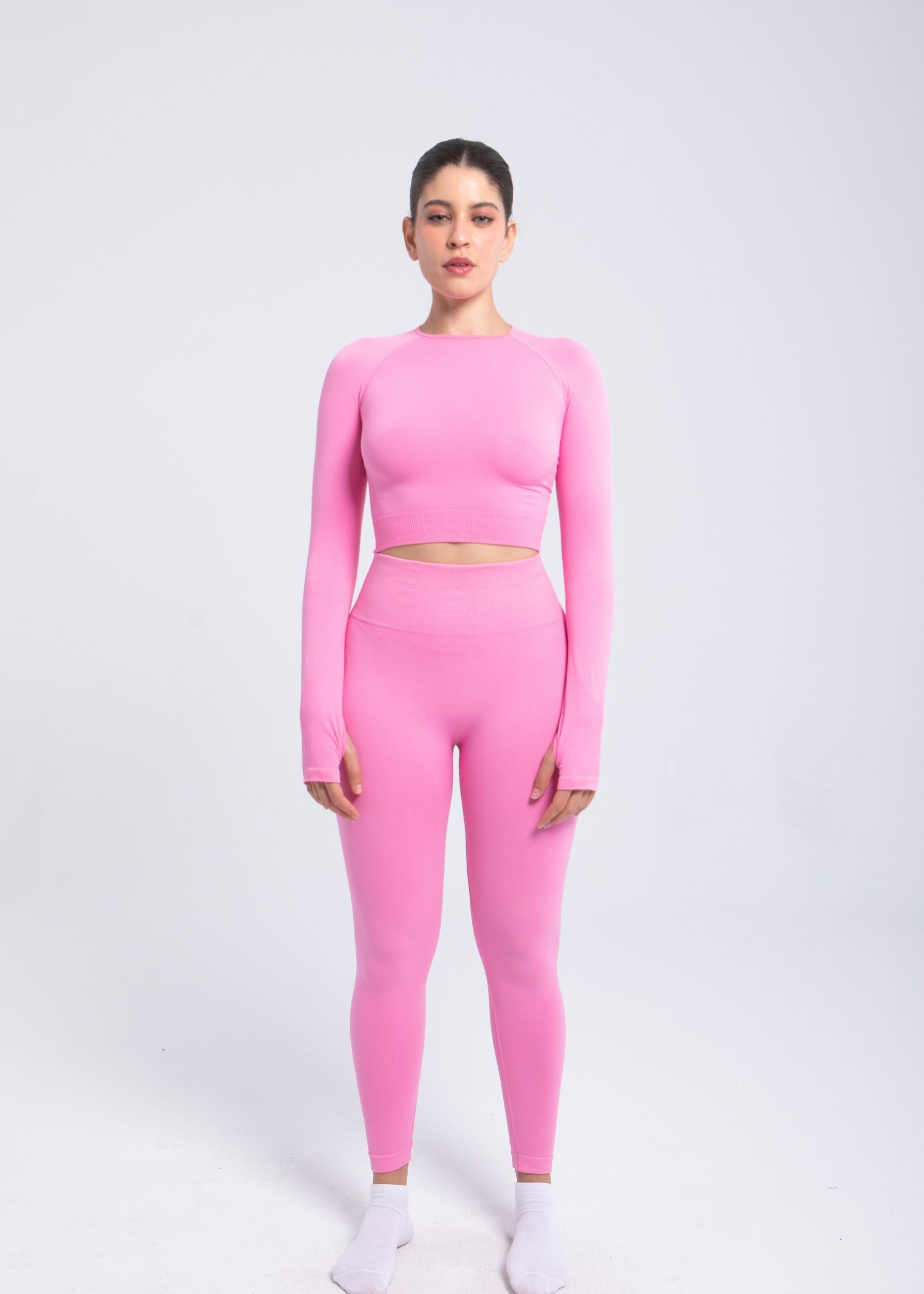 Second Skin long sleeve sculpting crop top in Rose Pink, full body look paired with leggings