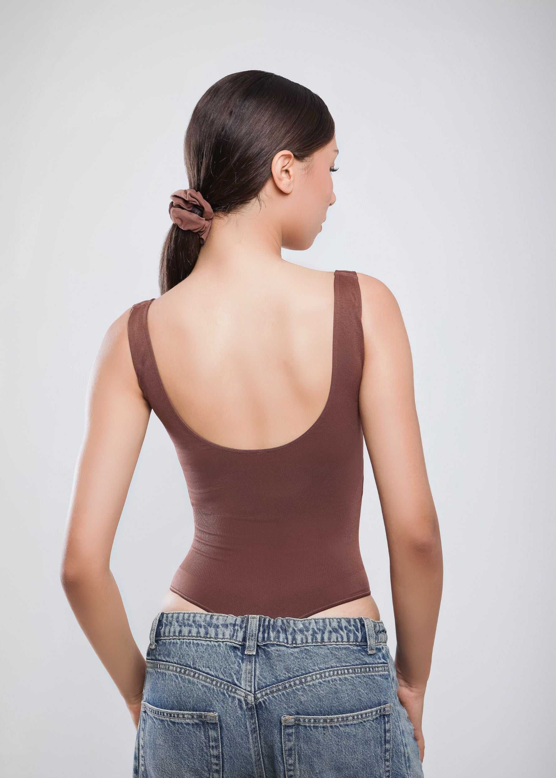 Second Skin Sculpting Thong Bodysuit in Cocoa Brown, worn back view